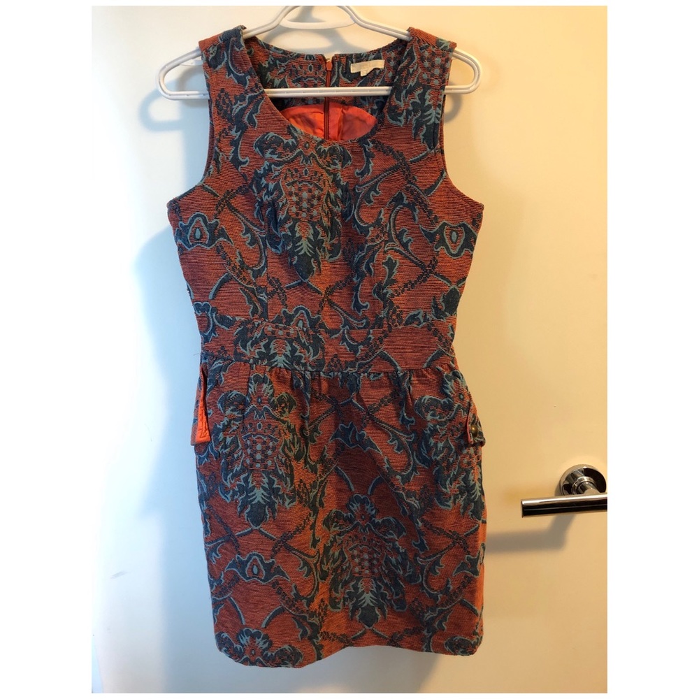 Brocade dress with pockets